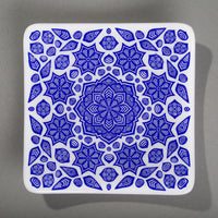 Sandcarved royal blue and white glass flower mandala plate.